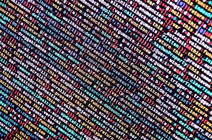 big data and internet of things trend. it specialist workplace. website html code on the laptop display